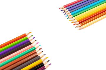 Many multicolored pencils, isolated on white background with copy space. Art and education background.