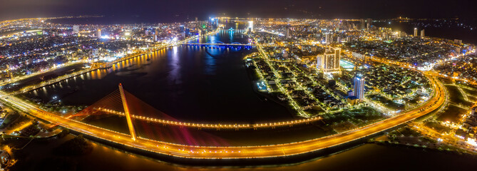 Fototapeta na wymiar Aerial view of Tran Thi Ly bridge which is a very famous destination of Da Nang city.