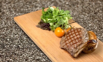 Meat marinated and cooked with sauce. National dish.