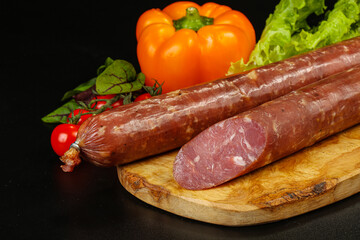 Pork ham sausage cut isolated