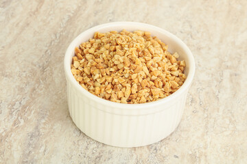 Crunched roasted peanut in the bowl