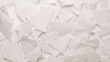 Empty white paper pieces as a background.