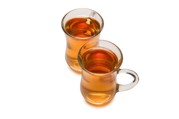 A turkish glass of tea isolated on white background.