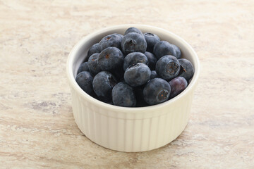 Sweet ripe blueberry heap in the bowl