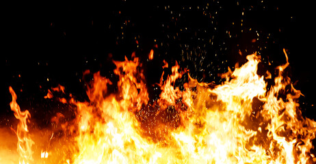 Fototapeta na wymiar Panorama Fire flames on black background. fire burst texture for banner backdrop.