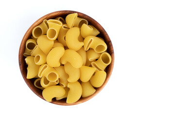 uncooked pipe rigate pasta isolated on white background