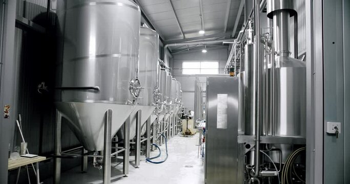 Beer production. Brewery, Beer factory concept. Modern tank for mashing malt for brewing beer in brewery plant. Brewing production. Distiller Sample, Bavaria Lab, Checking Laboratory. 