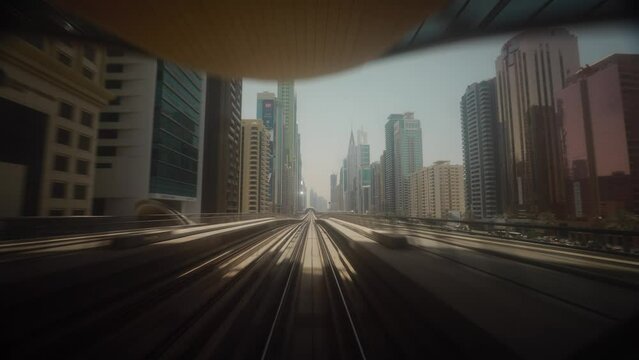 Time Lapse, Timelapse Metro In Dubai, United Arab Emirates. FPV POV At Fast Speed Drive Motion. hyperlapse Tunnel. driverless metro in blurred motion. futuristic city skyline in UAE.