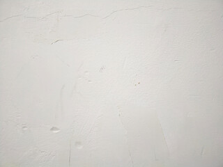 Textura de pared pintada y agrietada. Textura de yeso o escayola sobre pared lisa - obrazy, fototapety, plakaty