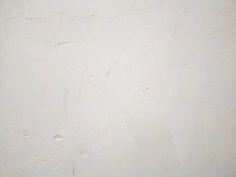 Textura de pared pintada y agrietada. Textura de yeso o escayola sobre pared lisa