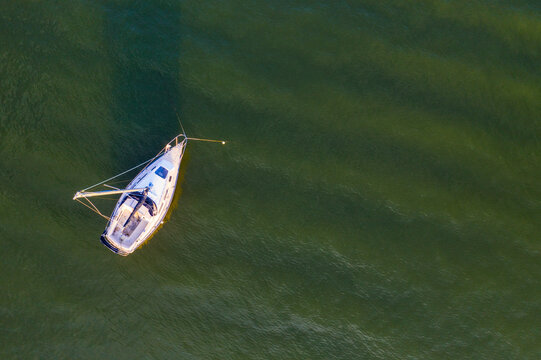 Aerial view of a sailboat sailing the Indian River, Sebastian Oaks, Florida, United States.