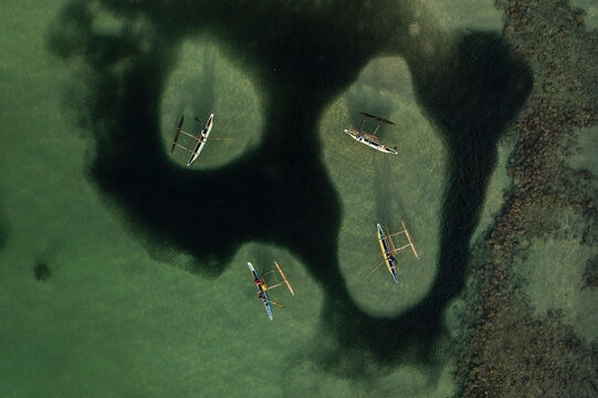 Aerial view of local fishermen in traditional wooden boats near Dickwella beach, Dikwella, Sri Lanka.