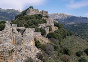 Fototapeta na wymiar View of the Southern Wall of Nimrod fortress with the Keem and the Beautiful Tower, located in Northern Golan, at the southern slope of Mount Hermon, the biggest Crusader-era castle in Israel 
