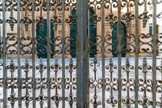 Iron gate protecting a baroque church in the historic center of Salvador, Pelourinho.