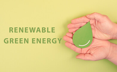 Holding a green drop, renewable green energy, alternative bio fuel, recycling resourses,...