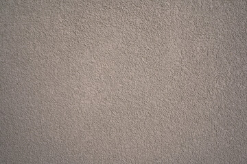 photo of grey-beige stucco on a plain wall for texture