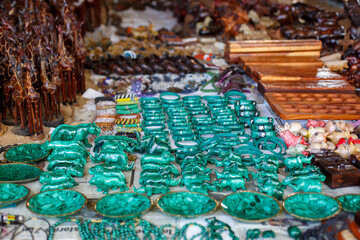 Jade souvenir carvings at a market in Victoria Falls, Zimbabwe - obrazy, fototapety, plakaty