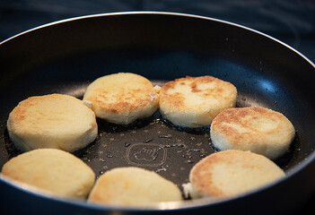 frying pan with cheese pancake
