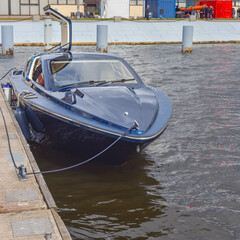 modern motor boat parked on the pier of the Russian city of St. Petersburg, Russia