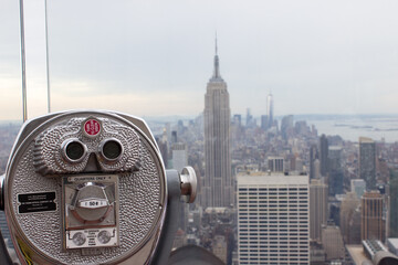 NYC top of the rock telescope with Empire State building in view