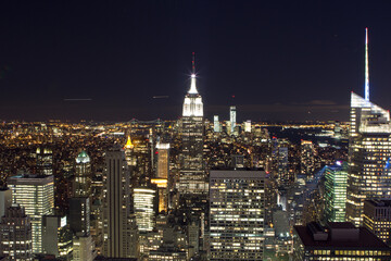 Naklejka na ściany i meble NYC skyline from top of the rock to empire at night