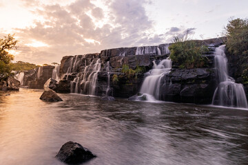 beautiful sunrise at the waterfall