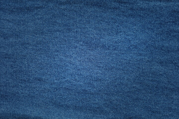 Close-up of blue denim jeans fabric texture background