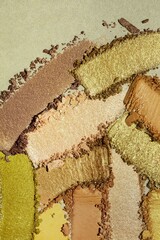 Eye shadow shimmering matte multi colored yellow golden brown beige nude palette texture background white isolated 