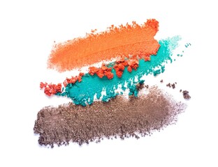 Eye shadow glitter shimmer and matte orange, brown dark blue yellow colored texture background white isolated	