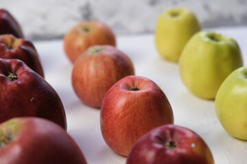 Green and red apples close up. Juicy fruits. Useful snack. Vegetarian food. Delicious, healthy snack. Vitamins, microelements. Fat burning. copy space