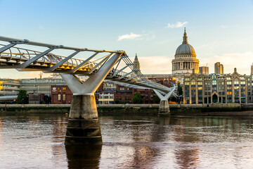 Fototapeta na wymiar St Paul's Cathedral and the Millennium Bridge in London in the morning