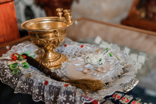 Wedding decoration in the church, crowns, wedding rings. Traditions