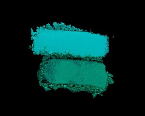 Eye shadow glitter shimmer and matte emerald green colored texture background dlack isolated