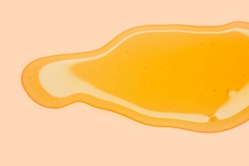 Cream gel yellow transparent cosmetic sample texture with bubbles isolated background