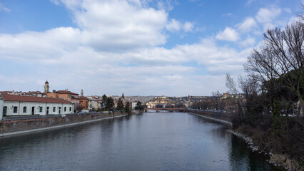 Obraz premium Images of the city of Verona in Italy. Classic buildings, bridges over the Adige river and churches of the city.