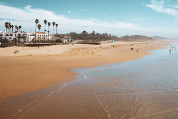 Wide sandy beach of Pismo Beach, a vintage coastal city in San Luis Obispo County,  California