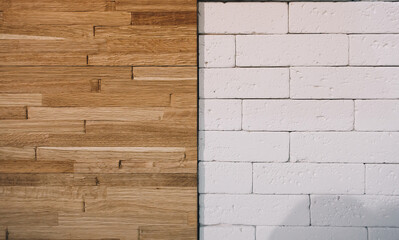Different surfaces: wooden planks and white concrete  bricks