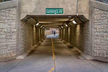 bike trail goes through underpass tunnel - part of extensive trail system in Fort Collins, Colorado - obrazy, fototapety, plakaty