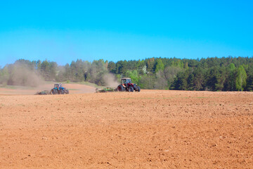 Ploughing tractor during cultivation agriculture
