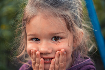 Cute shy little child girl smiling portrait happy childhood lifestyle 