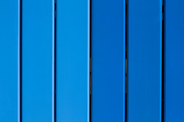 New painted with tones of blue empty wooden background.Vertical lines