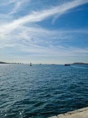 Panorama of Istanbul at skyline and seagulls over the sea. Wide landscape of Golden Horn