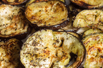 Close-up of a slice of eggplant cooked with spices. homemade and healthy food.
