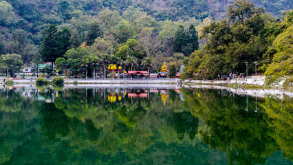 Fototapeta premium Distand view of Renuka Ji Temple and Parshuram Tal (Lake) a popular Hindu religious site in Nahan, Himachal Pradesh