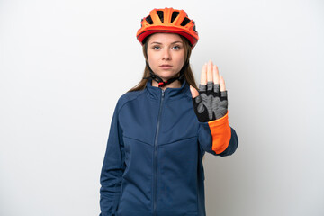 Young cyclist Lithuanian woman isolated on white background making stop gesture