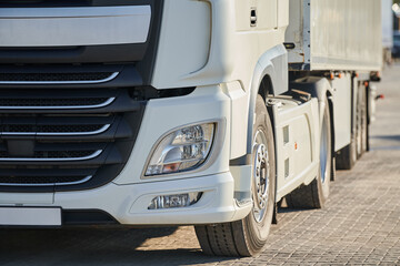 Heavy lorry truck at trucker parking. Logistics and transportation service