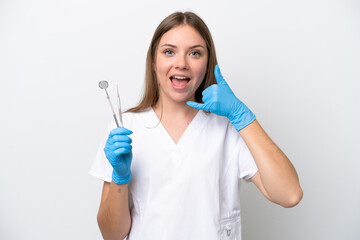 Dentist woman holding tools isolated on white background making phone gesture. Call me back sign