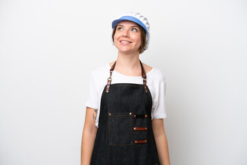 Fishmonger woman wearing an apron thinking an idea while looking up