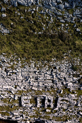 Aerial view on sign Ireland in Irish language EIRE made out of rocks in Burren area. West of Ireland. Popular travel region on Wild Atlantic Way known for it rock surface.