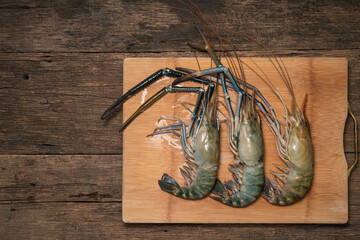 Fresh shrimp on on  a wooden background, Giant river prawn on  a wooden background.